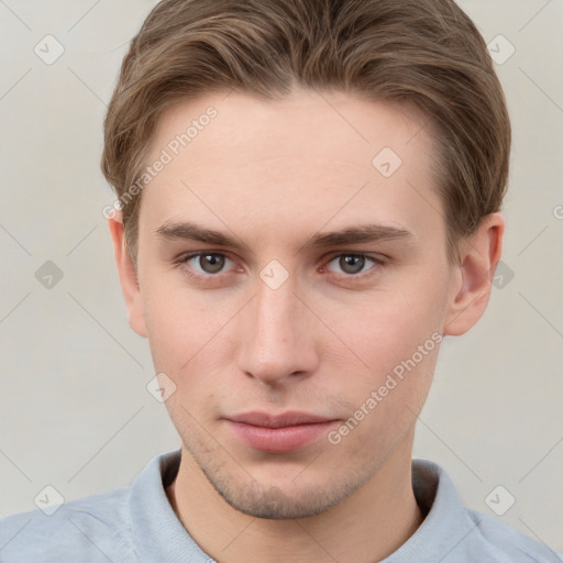 Neutral white young-adult male with short  brown hair and grey eyes