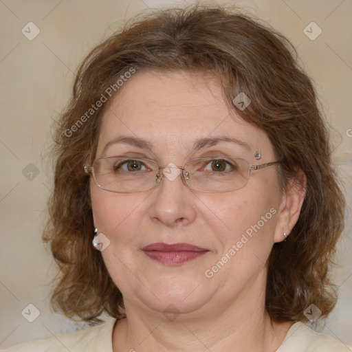 Joyful white adult female with medium  brown hair and green eyes