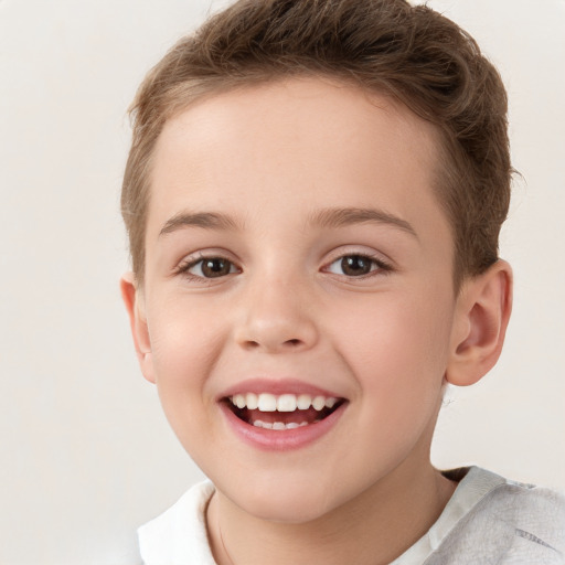 Joyful white child female with short  brown hair and grey eyes