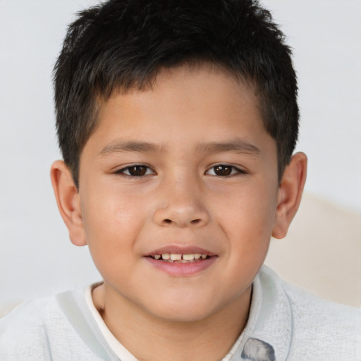 Joyful asian child male with short  brown hair and brown eyes