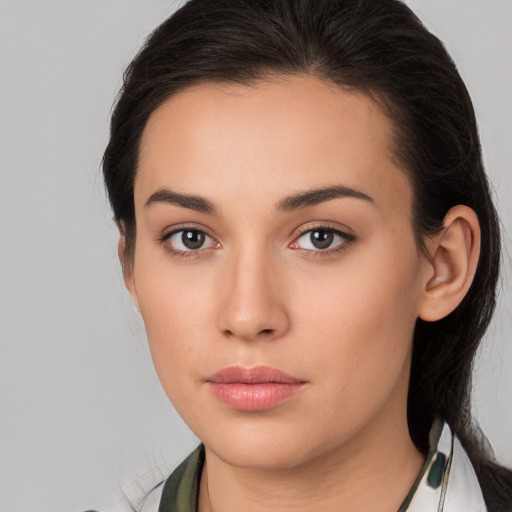 Neutral white young-adult female with medium  brown hair and brown eyes