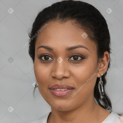 Joyful latino young-adult female with medium  brown hair and brown eyes