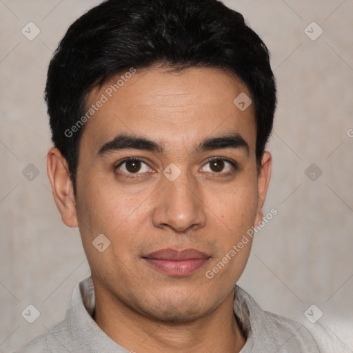 Joyful white young-adult male with short  black hair and brown eyes