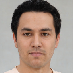 Neutral asian young-adult male with short  black hair and brown eyes