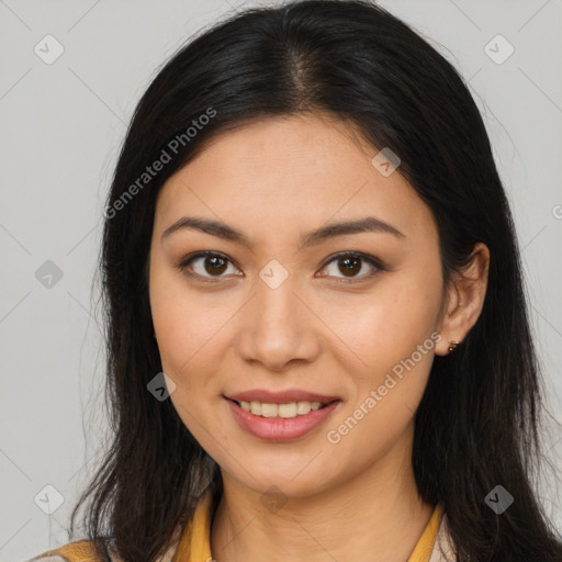 Joyful latino young-adult female with long  brown hair and brown eyes