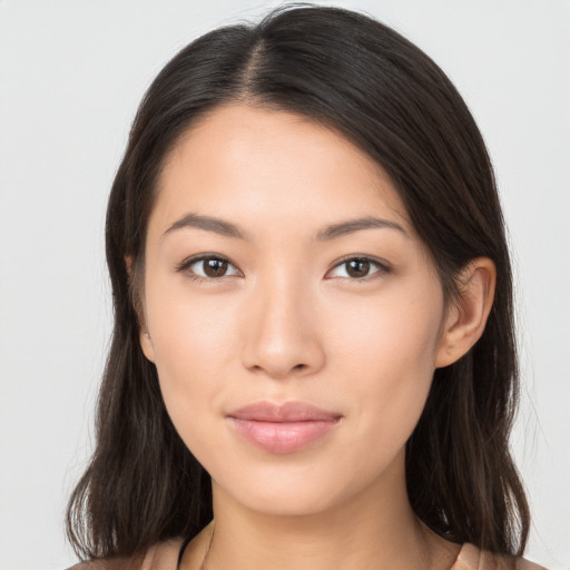 Neutral asian young-adult female with long  brown hair and brown eyes