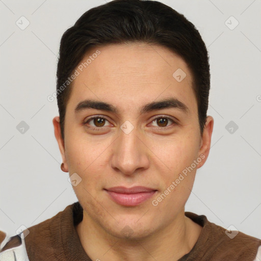 Joyful latino young-adult male with short  brown hair and brown eyes