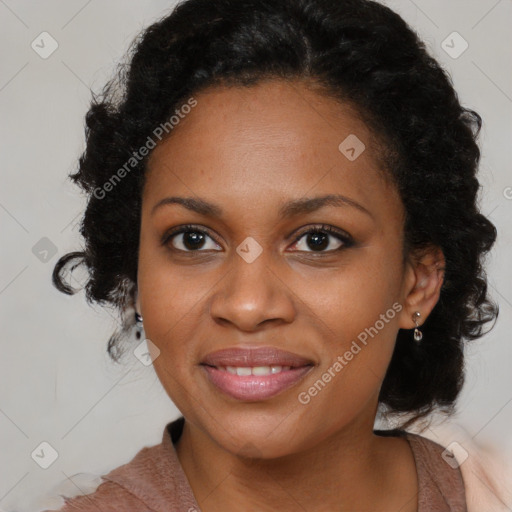 Joyful black young-adult female with medium  black hair and brown eyes