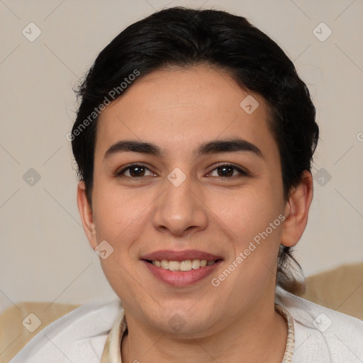 Joyful white young-adult female with short  brown hair and brown eyes