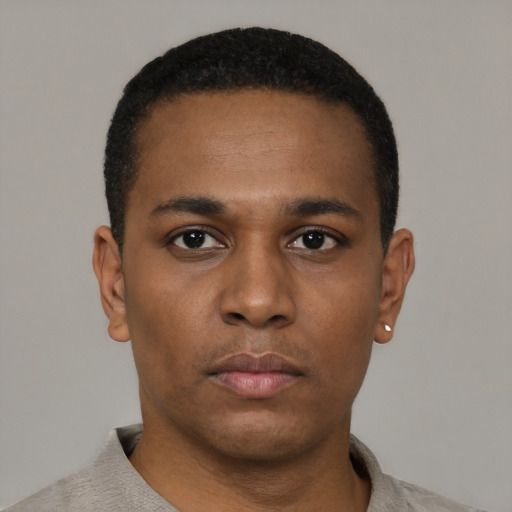 Neutral black young-adult male with short  black hair and brown eyes