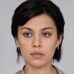 Neutral asian young-adult female with medium  black hair and brown eyes