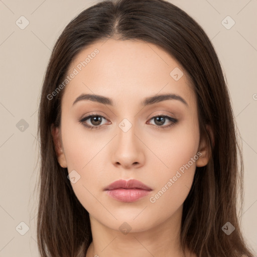 Neutral white young-adult female with long  brown hair and brown eyes