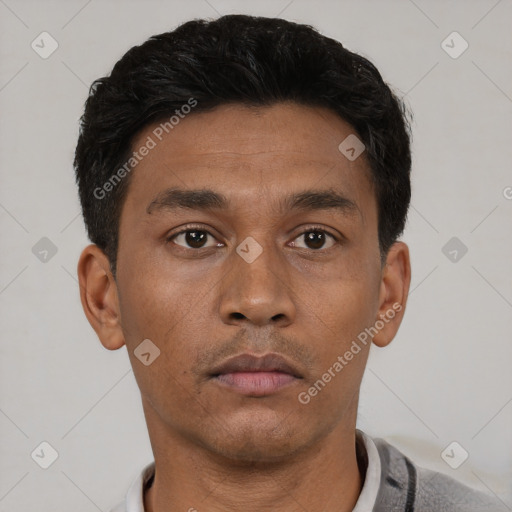 Neutral latino young-adult male with short  black hair and brown eyes