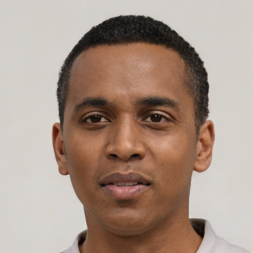 Neutral black young-adult male with short  black hair and brown eyes