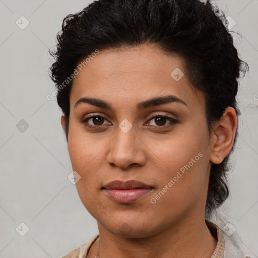 Joyful latino young-adult female with short  brown hair and brown eyes