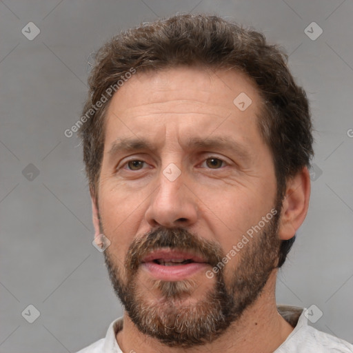 Neutral white adult male with short  brown hair and brown eyes