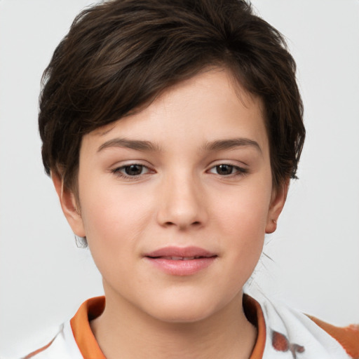 Joyful white child female with short  brown hair and brown eyes