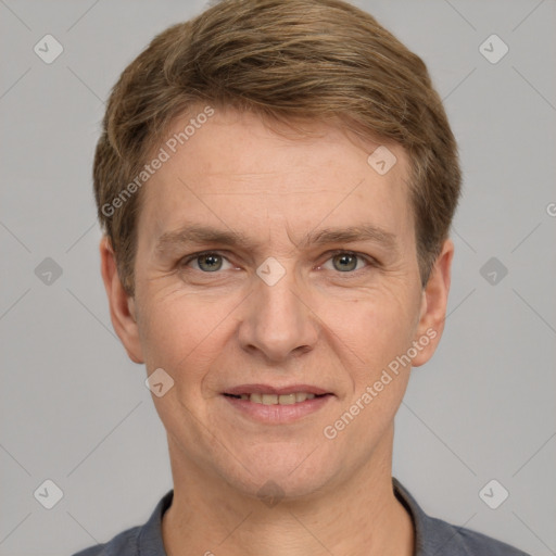 Joyful white adult male with short  brown hair and grey eyes