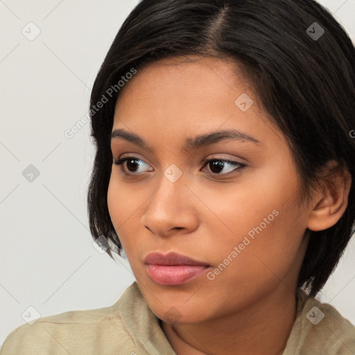 Neutral latino young-adult female with medium  brown hair and brown eyes