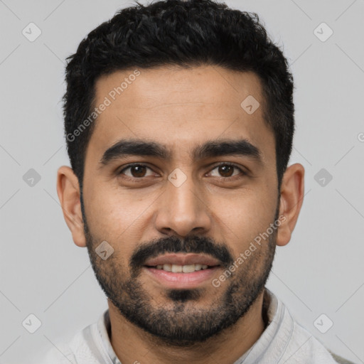 Joyful latino young-adult male with short  black hair and brown eyes