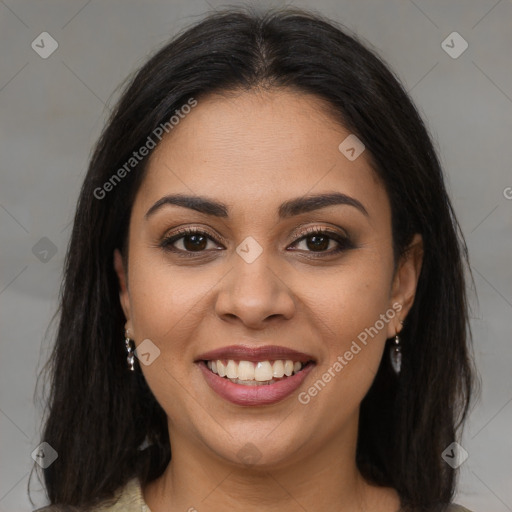 Joyful latino young-adult female with long  brown hair and brown eyes