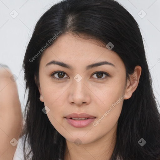 Joyful asian young-adult female with long  brown hair and brown eyes