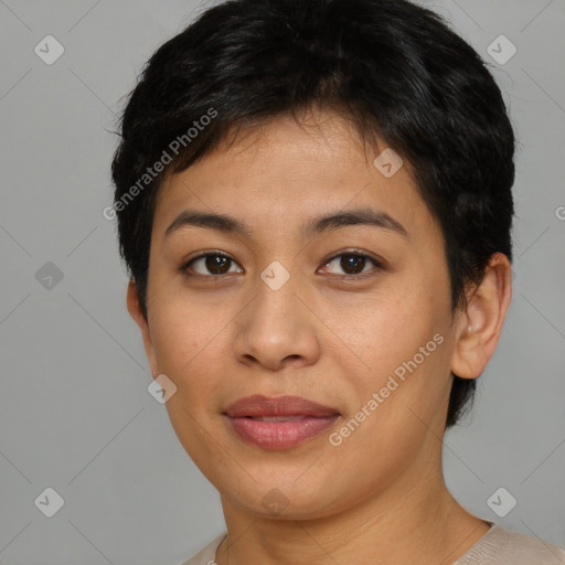 Joyful asian young-adult female with short  brown hair and brown eyes