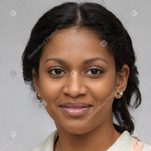 Joyful black young-adult female with medium  brown hair and brown eyes