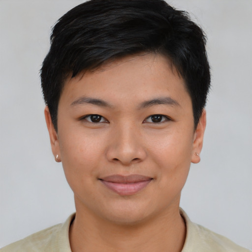 Joyful asian young-adult female with short  brown hair and brown eyes