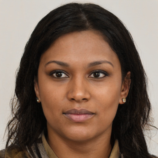 Neutral latino young-adult female with long  brown hair and brown eyes