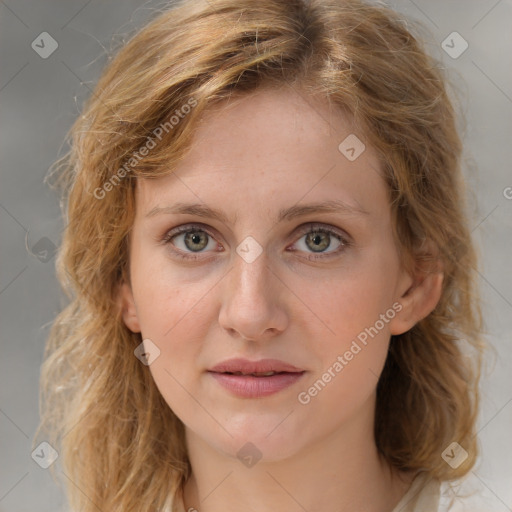 Joyful white young-adult female with medium  brown hair and blue eyes