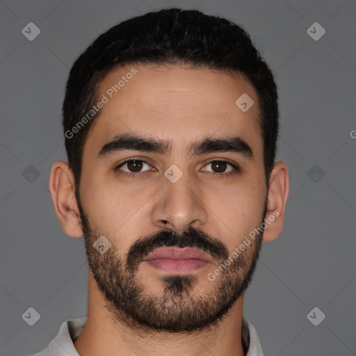 Joyful latino young-adult male with short  black hair and brown eyes