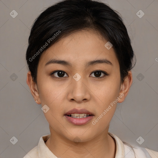 Joyful asian young-adult female with short  brown hair and brown eyes