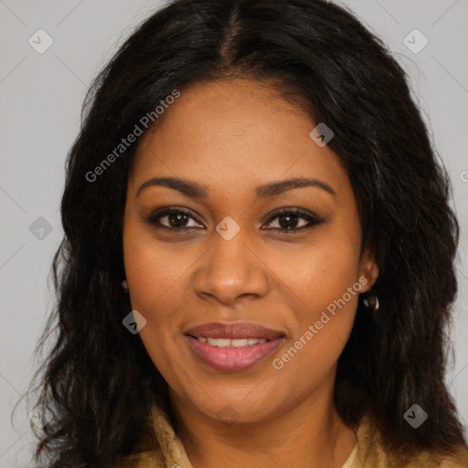 Joyful black young-adult female with long  brown hair and brown eyes