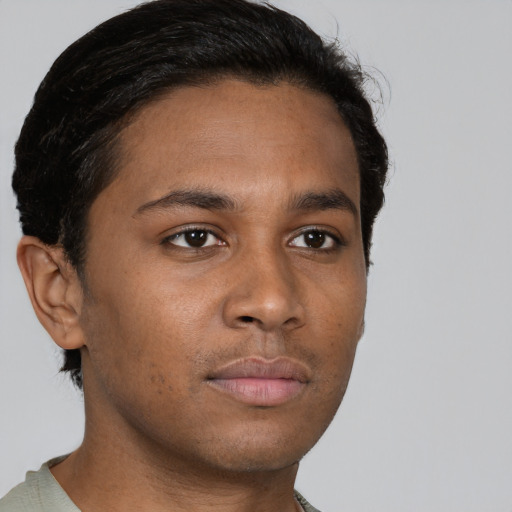 Neutral black young-adult male with short  brown hair and brown eyes