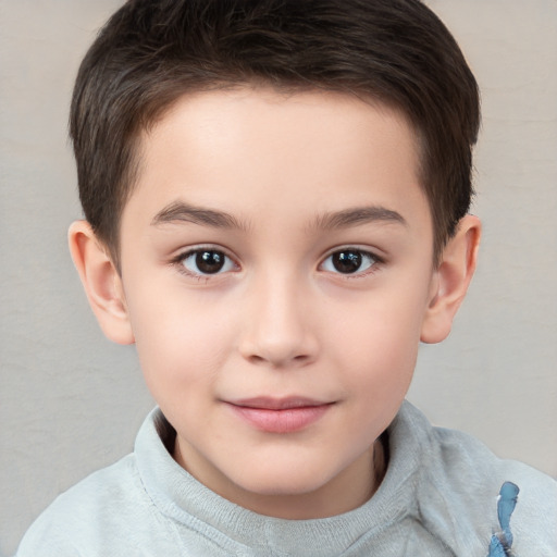 Joyful white child male with short  brown hair and brown eyes