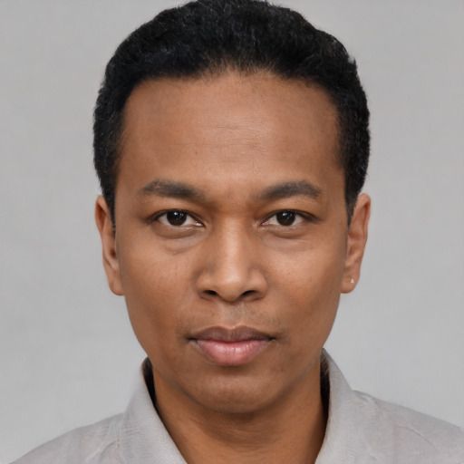 Neutral black young-adult male with short  black hair and brown eyes