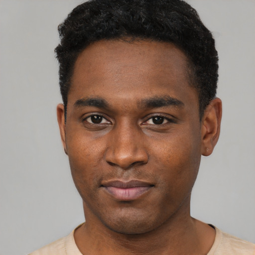 Neutral black young-adult male with short  black hair and brown eyes