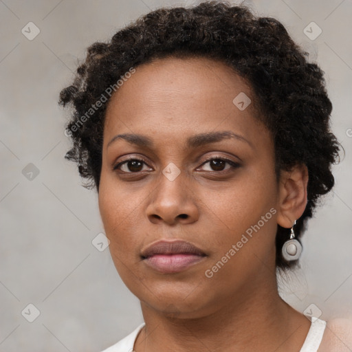 Neutral black young-adult female with short  brown hair and brown eyes