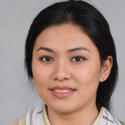 Joyful white young-adult female with medium  brown hair and brown eyes
