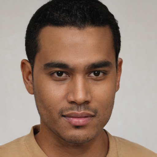 Neutral black young-adult male with short  black hair and brown eyes