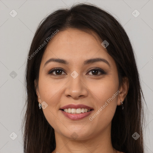 Joyful white young-adult female with long  brown hair and brown eyes