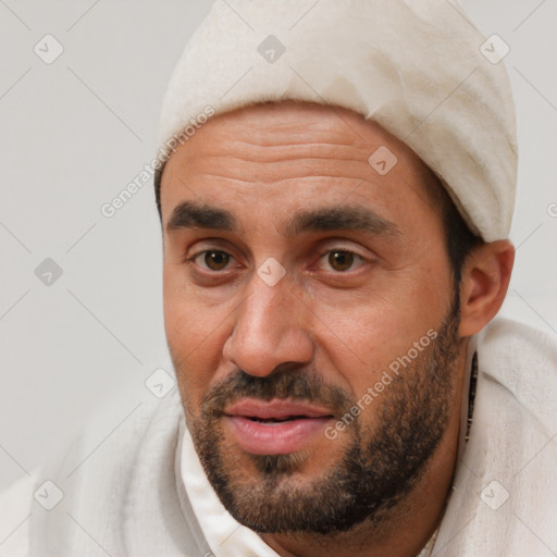 Joyful white adult male with short  black hair and brown eyes