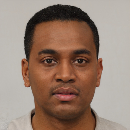 Neutral black young-adult male with short  black hair and brown eyes