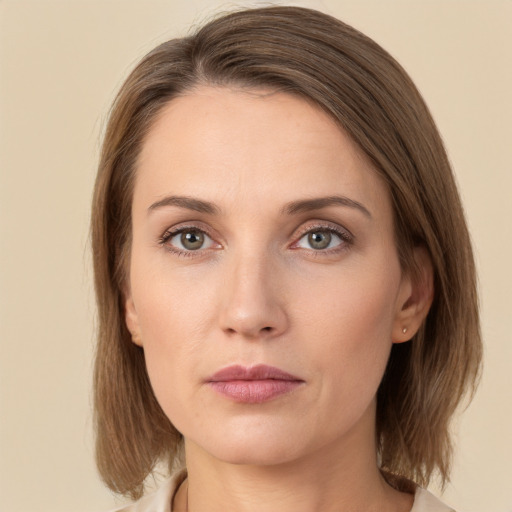 Neutral white young-adult female with medium  brown hair and green eyes