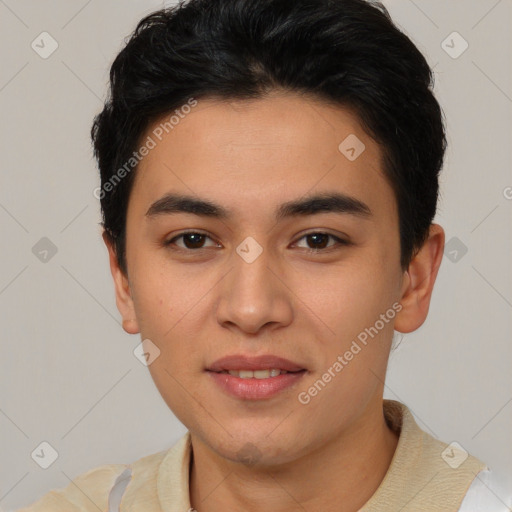 Joyful asian young-adult male with short  brown hair and brown eyes