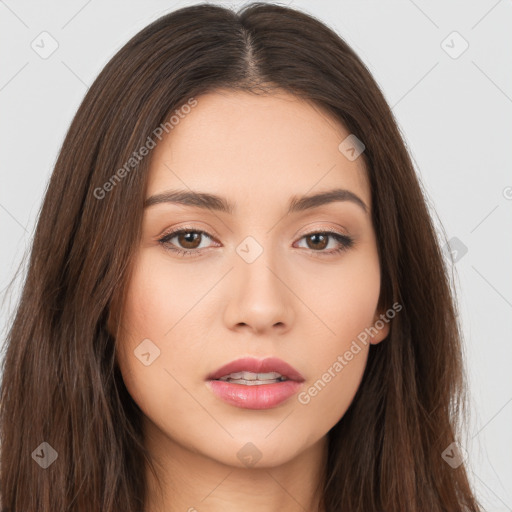 Neutral white young-adult female with long  brown hair and brown eyes