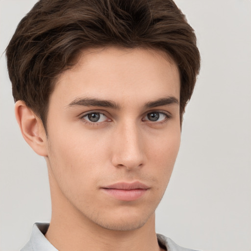 Neutral white young-adult male with short  brown hair and brown eyes