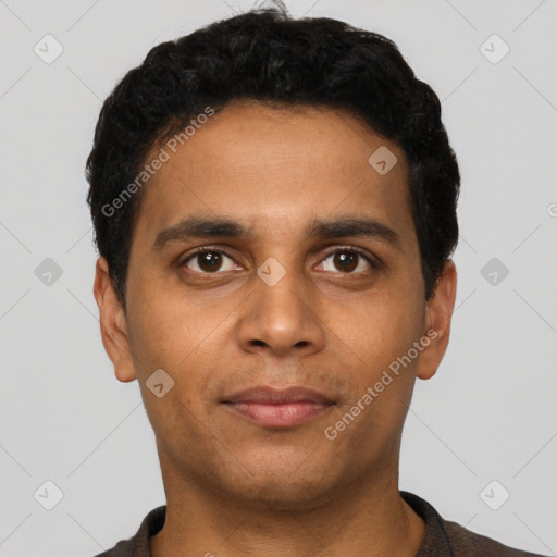 Neutral latino young-adult male with short  black hair and brown eyes