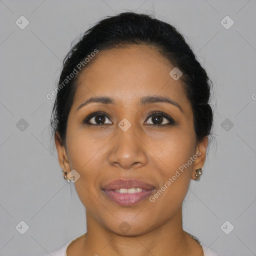 Joyful latino young-adult female with short  black hair and brown eyes